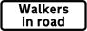 Walkers in road  safety sign