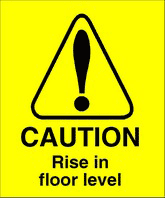 Rise in floor level sign Rise in floor level