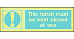 this hatch must be kept closed at sea  safety sign